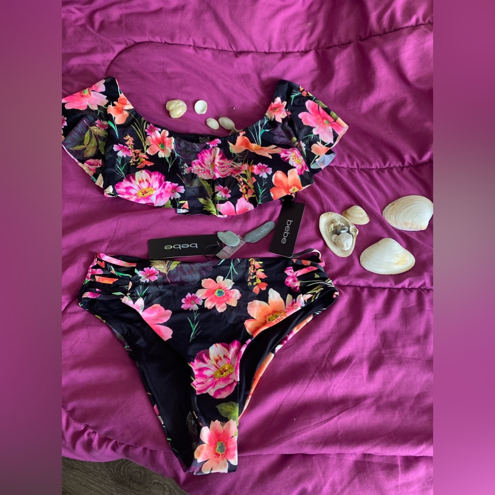Bebe brand swim suit. New in tags.